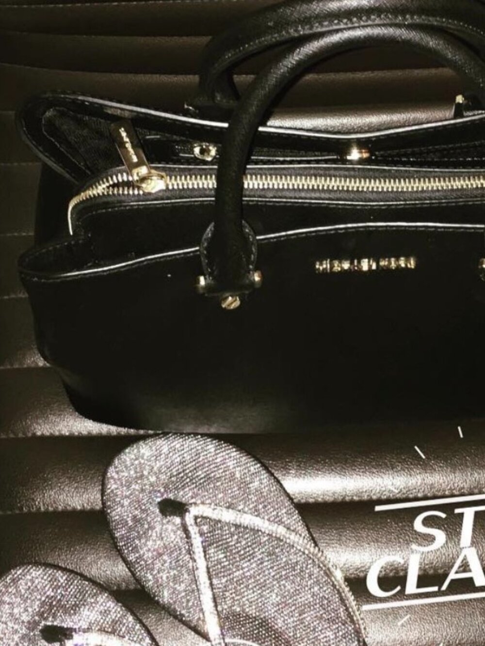 Michael Kors Black Leather Satchel with Gold Accents